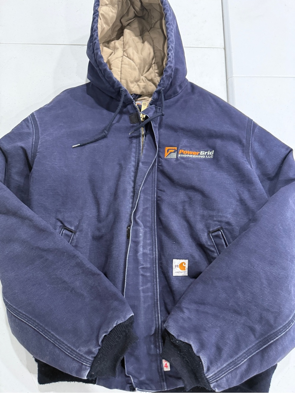 Carhartt Navy Quilted Hooded Fire Resistant Work Puffer with PowerGrid Logo